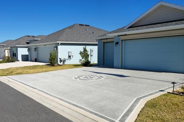Decorative concrete driveway with patterned design at a Central Florida home